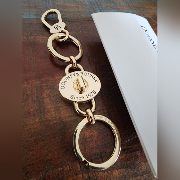 Dooney And Bourke Vallet Purse Charm Gold Keychain Turnlock NWT 1975